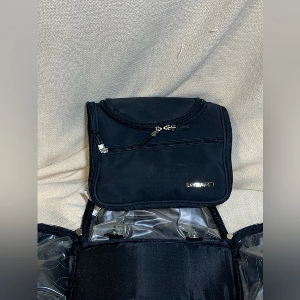 black travel bag for make up or toiletries